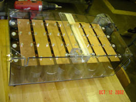 Complete Capacitor bank box with capacitors linked by oxygen free copper busbars.