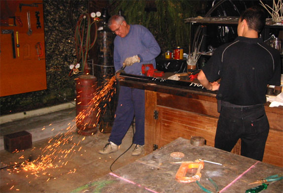 Grinding the metal so the weld stays on better.