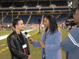 Sam being interviewed after a show in Detroit