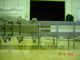 Close up on the Rail Stack / Injector attachment and the gap through which the top rail wires will exit.