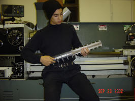 Posing with the nearly completed Rail/Injector assembly in front of a large mill.