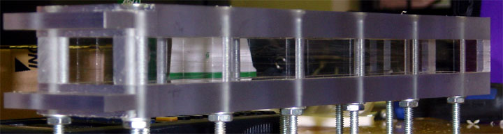 Close up on assembled projectile injector minus Teflon Rails.