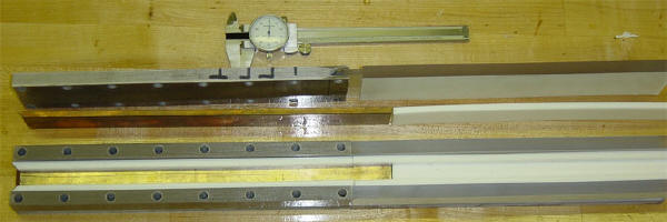 Top view of disassembled projectile injector and Rail Gun showing rails and rail spacers.