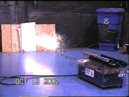 The metal vapor cloud follows the projectile to the target at a fraction of the muzzle velocity as it burns through the air.