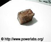  A 10 gram sodium cube. Notice the surface oxidation on it.