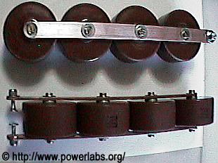 Two 50kV 6.8nF capacitor banks with integrated adjustable safety gaps.