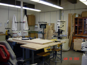 Looking from the back wall of the building; Jigsaw, Dust Filters, Drill Press, Bandsaw.